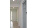 Bright entryway featuring tile floors, a door with sidelight, and neutral walls at 5045 Balsam Falls Rd, Deland, FL 32724