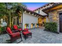 Exterior space featuring outdoor seating with potted plants at 10122 Royal Island Ct, Orlando, FL 32836