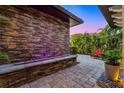 Outdoor space with a water feature and patio seating at 10122 Royal Island Ct, Orlando, FL 32836