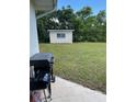 Expansive backyard features plenty of room with convenient shed in view at 1022 E 3Rd Ave, Mount Dora, FL 32757