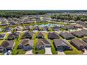 Bird's eye view displays the property's location within a thriving residential community at 1627 Mclucas Ln, The Villages, FL 34762