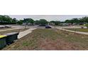 A residential street with a well-kept lawn in a quiet neighborhood, offering a peaceful setting at 1224 Lakeview Dr, Clermont, FL 34711
