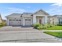 Beautifully landscaped single-Gathering home featuring a three-car garage and neutral stucco at 2666 Meadowedge Loop, St Cloud, FL 34772