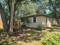 Lawn and landscaping on the side and back of the home at 365 Fletcher Ave, Daytona Beach, FL 32114