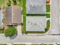 Overhead view of neighborhood houses, showing roof lines, landscaping, and street layout at 2235 Harbor Town Ln, Lakeland, FL 33810