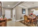 Traditional dining room with elegant table, chairs, and decorative accents at 3222 San Leo Dr, Orlando, FL 32820