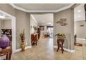 Welcoming foyer with tile flooring, decorative furnishings, and open view to the living space at 3222 San Leo Dr, Orlando, FL 32820