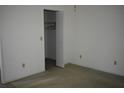 Neutral bedroom offering closet space and carpet floors at 610 Swallow Ct, Apopka, FL 32712