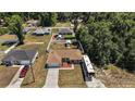 Aerial view of the home showcasing the manicured landscaping and RV parking at 7162 Se 124Th St, Belleview, FL 34420