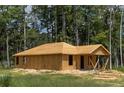 New construction home with wood framing, showing the structure and potential of a custom-built residence at Lot 21 Indian Estates Cr 423, Lake Panasoffkee, FL 33538