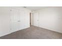 Spacious bedroom featuring a large closet and neutral walls, providing a blank canvas for personalization at 4713 Sw 86 Ln, Ocala, FL 34476