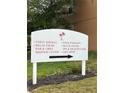 Community directional signage for Regal Palms features guest services, pool, spa, business center, and gift shop at 130 Napoli Dr, Davenport, FL 33897