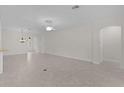 Spacious living area with neutral tones and ample natural light at 2954 Heiny Pl, The Villages, FL 32163