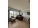 Spacious home office with plantation shutters at 633 Grand Cypress Pt, Sanford, FL 32771