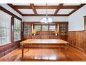 Stately dining room showcases built-in cabinetry and detailed woodwork at 263 Ne 1St St, Webster, FL 33597