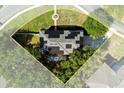 Aerial shot of the home showcasing the roof and landscaping at 800 Daybreak Dr, Fruitland Park, FL 34731