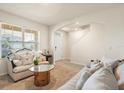 Inviting living room featuring neutral decor, plush seating, and an entryway at 5386 Pine Lilly Dr, St Cloud, FL 34771