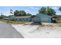 Charming single story home with a detached two car garage and carport at 1048 Cr 452A, Lake Panasoffkee, FL 33538