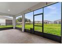 Screened-in patio perfect for enjoying the outdoors while offering protection from insects at 4701 Nw 51St Terrace Rd, Ocala, FL 34482