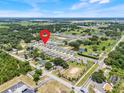 Aerial view of a residential community, highlighting its location and surrounding landscape at 853 Blue Creek Dr, Haines City, FL 33844