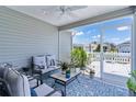 Cozy porch with comfortable seating, views of the surrounding neighborhood, and a relaxing outdoor atmosphere at 1478 Erika Pl, The Villages, FL 32163