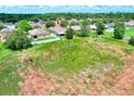 Spacious property showcasing a well-maintained single-story home with expansive grassy land at 6906 Glenbrook Dr, Lakeland, FL 33811