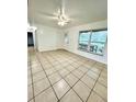 Spacious living room with lots of natural light and open floor plan at 302 W Rose Ln, Lady Lake, FL 32159