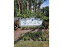 Regency Park at Lake Mary sign with manicured landscaping at 711 Sugar Bay Way # 115, Lake Mary, FL 32746