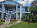Apartment building exterior featuring multiple units and outdoor staircases at 711 Sugar Bay Way # 115, Lake Mary, FL 32746