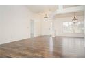 Bright living room boasting hardwood floors and plenty of natural light at 5005 County Road 125B1, Wildwood, FL 34785