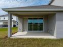Cozy covered patio featuring sliding glass doors with backyard views at 5409 Marshelder St, Apopka, FL 32712