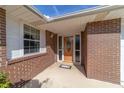 Inviting front entrance with a wood door and sidelights at 3261 Se 32Nd St, Ocala, FL 34471