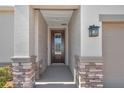 Inviting entryway with decorative stone pillars and a stylish front door at 4358 Nw 57Th Ave, Ocala, FL 34482