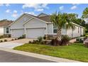 Attractive home with neutral exterior, well maintained landscaping and dual garage at 5237 Nw 48Th Pl, Ocala, FL 34482