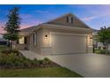 Charming single-story home with neutral paint, well-maintained lawn and a two-car garage in a peaceful neighborhood at 8925 Sw 76Th St, Ocala, FL 34481