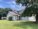 Lovely home with well maintained lawn and mature trees, plus updated windows at 2233 Ardon Ave, Orlando, FL 32833