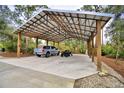 Covered carport with parking for two vehicles at 112 Reedy Creek Dr, Frostproof, FL 33843