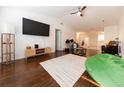 Inviting living room with hardwood flooring, contemporary decor, and a spacious feel at 821 Orchid Springs Dr # 821, Winter Haven, FL 33884