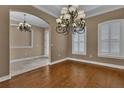 Spacious dining area with arched doorways and abundant natural light offers a warm, inviting ambiance at 6487 Ashley Dr, Lakeland, FL 33813