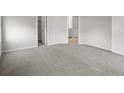 Spacious bedroom featuring plush carpeting and ample natural light at 2101 Summerlake Dr, Auburndale, FL 33823