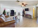 Bright living room featuring tile floors and large windows at 200 Holland Street, Lake Wales, FL 33859