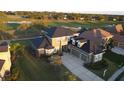Beautiful home on a golf course with a large yard and three-car garage at 7330 Reflections Lake Dr, Lakeland, FL 33813