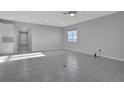 Spacious living room with tile flooring and an open floor plan at 256 Lake Smart Cir, Winter Haven, FL 33881