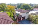 Aerial view of condo, showing private balcony and surrounding landscape at 17 Loma Verde # 17, Lakeland, FL 33813