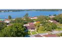 Aerial view of lakefront property, showcasing the home's location at 17 Loma Verde # 17, Lakeland, FL 33813