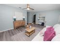 Bright living room features new flooring, modern decor, and stylish furnishings creating a welcoming space at 1220 Woodland Ave, Lakeland, FL 33801