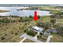 Aerial view of the property, highlighting its proximity to the lake at 217 S Kelly St, Lake Hamilton, FL 33851