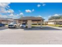 Carport offers covered parking for residents and guests at 2256 Firestone Pl, Winter Haven, FL 33884