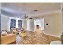 Spacious living room with tile floors and fireplace at 415 W Beacon Rd, Lakeland, FL 33803