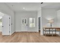 Inviting entryway with wood-look tile flooring, creating a warm and welcoming ambiance at 570 Gandhi Dr, Lakeland, FL 33813